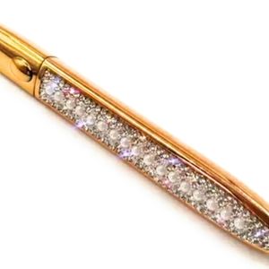 Adhesive eyeliner pen is